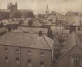 View of Exeter from the roof of the Conservative Club.  Half Moon Hotel, demolished 1912, Bedford Street front in the foreground